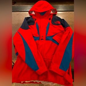 A Mens North Face Extreme Weather pullover